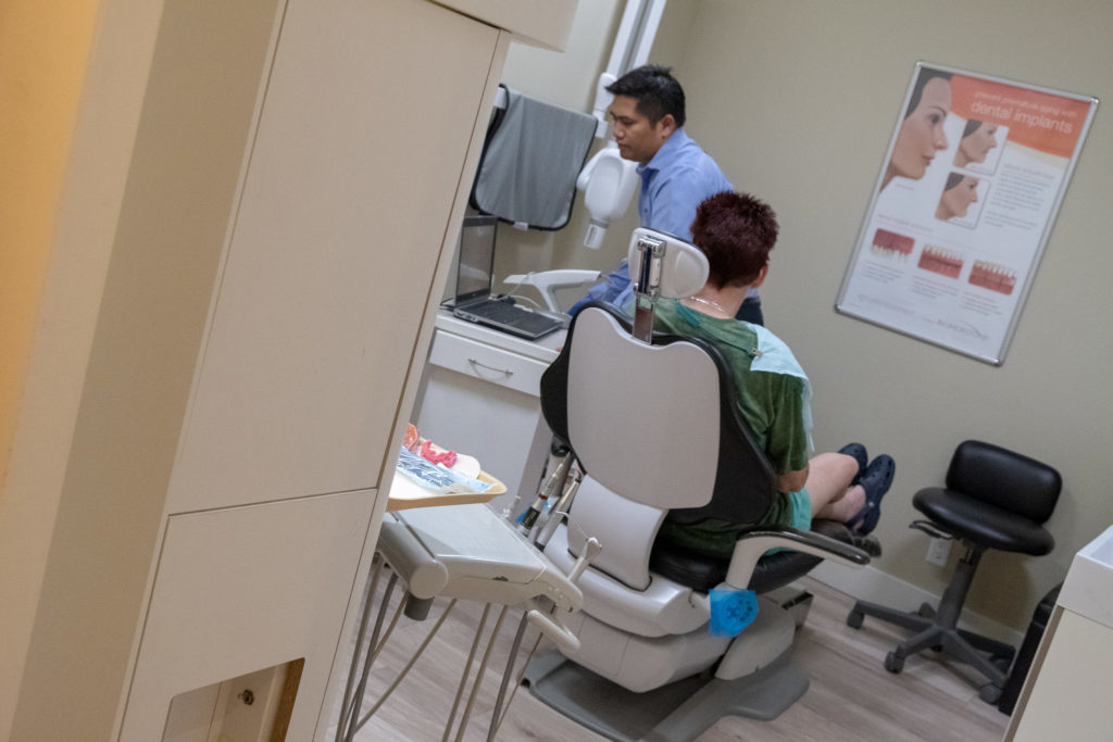 Patient seeing Dr. Reyes getting a consultation for TMJ at North Shores Dental in Toronto, ON.